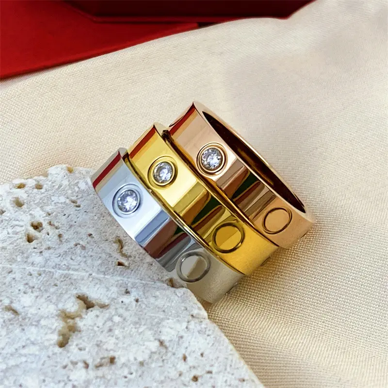 Anillo de marca de moda Anillo de pareja de acero de titanio Sin diamante Anillo de acero inoxidable de tres diamantes Fabricante Joyería al por mayor