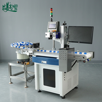 Machine tout-en-un de codage laser pour bouchons de bouteilles en plastique avec laser UV 355 nm, alimentateur vibrant et inspection visuelle