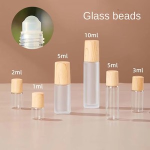 卸売り1ml木目蓋2mlつや消し透明ガラスローラーボールボトル5mlオイル10mlスプリットボトルロール付きシール - Product Image 2