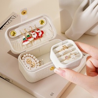 Boîte de rangement portable en cuir pour bijoux, accessoire de voyage minimaliste pour bagues, boucles d'oreilles et rouges à lèvres, vente transfrontalière