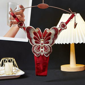 Tangas Sexys de Encaje Transparente para Mujer, con Accesorios de Mariposa, Venta al Por Mayor de Fábrica - Product Image 1