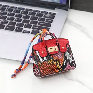 New Eco-Friendly High Quality Snakeskin Mini Bag Pendant Luxury Pu Leather Cute Coin Purse Headphone Bag Keychain