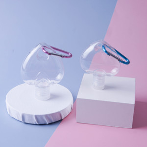 30ml 50ml di plastica PETG a forma di cuore appeso disinfettante per le mani bottiglia di gel con moschettone portachiavi clip e protezione di vibrazione - Product Image 2