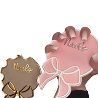 Présentoir à ongles en acrylique avec bordure dorée et nœud papillon, multicolore, pour manucure, accessoire photo pour selfies, support de prise de vue pour nail art, pour usage en salon de manucure