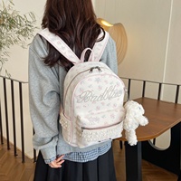 Sac à dos pour filles à l'aspect élégant et tendance, imprimé en dentelle, avec pendentif en peluche détachable, pour l'école et l'usage quotidien