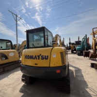 Mini-chargeuse sur chenilles Komatsu PC56 d'occasion, modèle 2025, 5,6 tonnes, moteur 34 kW, certifiée, testée, inspectée, accessoires inclus