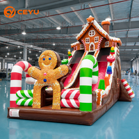 Toboggan gonflable Ceyu Maison en pain d'épices avec doubles toboggans rouges, arche en forme de canne à sucre, décorations en forme de bonbons, base en chocolat, pour le plaisir des fêtes en extérieur