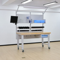 Banco de Trabajo Resistente para Electrónica con Estantes Modulares, Cajones y Accesorios Industriales para Aplicaciones en Talleres y Fábricas