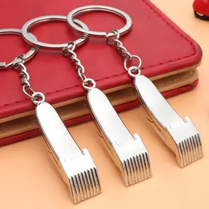 Saç kurutma makinesi Metal anahtar zincirleri tarak makas kolye kuaför moda berber saç stilist için çanta anahtarlığı asılı süs hediye