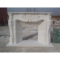 Cheminée d'intérieur de style européen sculptée à la main Cheminée en marbre blanc décorative autoportante Style de designer
