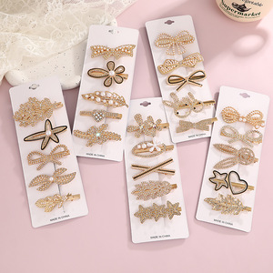 Pinza para el pelo con diseño de lazo de aleación dorada y diamantes de imitación para mujer, accesorio para el cabello de uso diario. - Product Image 2