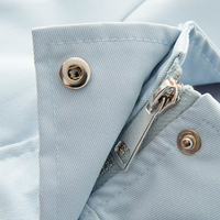Veste coupe-vent légère et décontractée pour femme avec col montant, taille à cordon de serrage, patte de boutonnage cachée et coupe courte