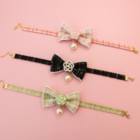 Collier pour animaux de compagnie de style princesse haut de gamme en coton et polyester, motif rayé, décoration nœud papillon, parfum agréable, confortable à porter
