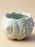 Pot de fleurs en céramique à motif coquillage en relief sur le thème de l'océan, design vintage corail et conque pour la décoration de maison de plage