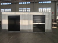 Unité de stockage extérieure moderne en acier, mini-bâtiment de haute qualité, solution d'atelier et d'entrepôt avec porte enroulable