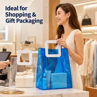 Sac fourre-tout en PVC translucide coloré avec poignée carrée, idéal pour l'emballage cadeau, sac de vente au détail étanche pour boutique, personnalisable avec logo OEM