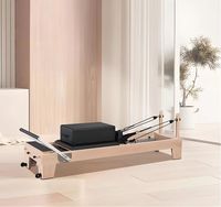 Machine de Pilates Reformer en Bois d'Érable pour Studio Commercial, Durable, Portable, Réglable, Emballage d'Exportation avec Coussin en PU