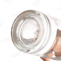 Bouteille de spiritueux cylindrique haut de gamme 500 ml en verre silex haute transparence pour whisky, vodka, tequila, brandy, gin, avec logo personnalisé, directement de l'usine