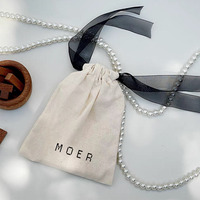 Vente en gros de pochettes à cordon en coton recyclable de haute qualité pour bijoux, bagues, boucles d'oreilles, bracelets, montres et lunettes