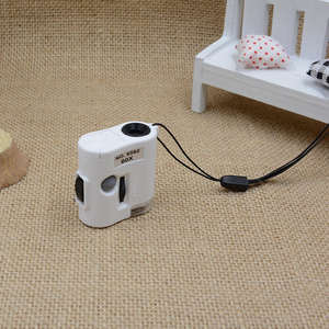 عدسة مكبرة محمولة 60 مرة مع ضوء LED وأشعة فوق بنفسجية لقراءة الصحف والمجوهرات مع حزام تعليق - Product Image 3