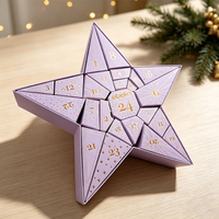 Boîte de calendrier de compte à rebours rigide haut de gamme éco-responsable, motif étoile violette, avec numéros estampés à chaud dorés, panneaux géométriques et étui assorti