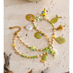 JINYOU 5885 Collana Bohemien Placcata Oro in Acciaio Inossidabile con <span class=keywords><strong>Perline</strong></span> in <span class=keywords><strong>Legno</strong></span>, Ciondoli Smaltati a Forma di Pesce, Stella Marina, Perle e Resina - Product Image 2