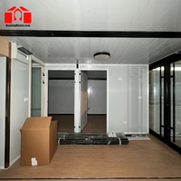 Großhandelspreis 20ft Erweiterbares Stahl-Sandwichpanel-Containerhaus 4 Schlafzimmer Modernes Vorgefertigtes Haus Modulare Kabine Hotel/Campingplatz