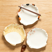 Nouvelles assiettes en céramique créatives en forme de chat Kawaii, assiettes à dessert irrégulières en céramique mignonnes de style dessin animé pour la maison et la restauration