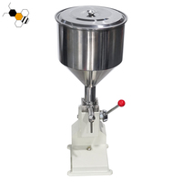 Machine de remplissage manuelle haute précision à prix d'usine pour liquides visqueux (miel, huile, jus, boisson, pâte de tomate, confiture, sauce)
