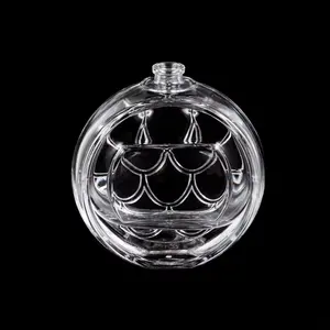 Emballage de bouteille de cosmétiques de luxe de parfum en relief rond créatif de haute qualité bouteille en verre de parfum en cristal