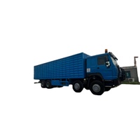 Truk Box HOWO 8x4 Off Road Tugas Berat Sinotruk 12 Roda Truk Van Kargo Tertutup Truk Transportasi Logistik Jarak Jauh