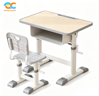 Ensemble bureau et chaise d'école ergonomique gris à levage manuel, mobilier scolaire en métal pour salle de classe, usage intensif, vente en gros B2B