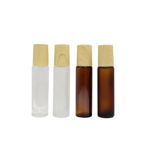 Venta al por mayor en stock: Botella de vidrio premium con rodillo de 5ml-15ml y tapa de madera, botella transparente para perfume, crema para ojos y masajes de piel. - Product Image 4