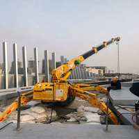 Mini-grue sur chenilles de deux tonnes, type araignée, avec télécommande sans fil pour les levages et les tâches de manutention dans les espaces confinés