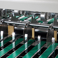 Machine de découpe automatique de rouleaux de papier, contrôlée par PLC, avec moteur électrique robuste pour le papier