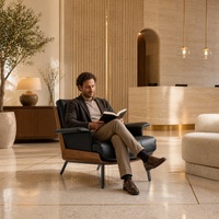 Fauteuil lounge en cuir rembourré, coque en noyer noir, pieds en métal, personnalisable OEM, pour hall d'hôtel et salon