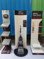 Magasin de détail personnalisé magasin pose libre tapis de sol en métal nettoyeur à vapeur produit présentoir support