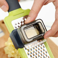 Accessoires de cuisine : Nouveau hachoir à ail manuel multifonctionnel 2025 – Presse-ail et râpe