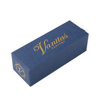 Boîte d'emballage de parfum 10 ml avec poignée en ruban, texture papier, logo gaufré feuille d'or et doublure en mousse EVA pour cosmétiques et soins de la peau
