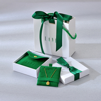 Nouveau logo personnalisé d'usine ensemble d'emballage de bijoux en daim sac à pression collier pochette à bijoux en microfibre et sac à main en papier