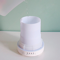 Humidificateur d'air en porcelaine pour bureau à domicile Diffuseur d'huiles essentielles en céramique Diffuseur d'arômes ultrasonique électrique Humidificateur d'air