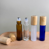 Flacon roll-on de luxe écologique en verre dépoli transparent 5ml 10ml pour parfum et huiles essentielles avec couvercle en bambou et logo gravé – Cosmétique
