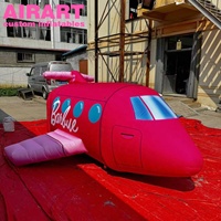 Avion d'air rose de dessin animé gonflable réaliste, ballon d'avion gonflable d'exposition de science et de technologie de musée de fête de douche de bébé