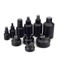 Vente en gros 15g 30g 50g Noir mat Pompe à épaulement oblique Bouteille en verre Pot de crème Emballage cosmétique en verre