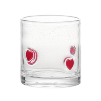 Tasse en verre incrustée de coquillages, texture pétillante, design inspiré de l'océan, idéale pour les boissons, décor sur le thème de la plage, cadeau unique.