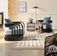 Ensemble de chaises longues en rotin noir moderne avec coussins en tissu pour salon, hôtel et villa, meubles de détente pour l'intérieur