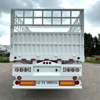 Semi-remorque à 4 essieux avec clôture haute, parois latérales en acier renforcé, pour le transport de matériaux de construction et de marchandises en vrac