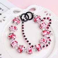 Kit de bijoux perlés DIY tendance, peints à la main, en acrylique/plastique/lucite, pour bracelet de téléphone ou bracelet, avec design de poupée mignonne, pour empiler