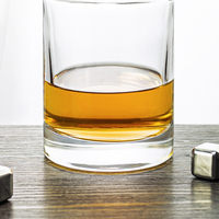 Decantador de whisky redondo de cristal de lujo con tapón de vidrio Fábrica al por mayor para uso doméstico