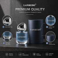 Bouteille de parfum en verre lestée personnalisée en gros, 50 ml, 100 ml, cylindrique, vide, avec bouchon en forme de galet argenté